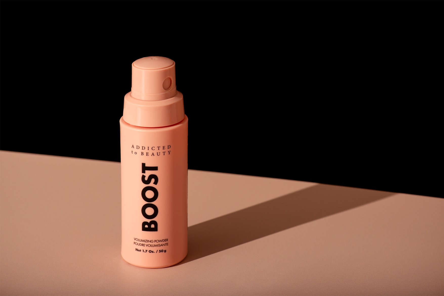 Boost Volumizing Powder Bottle with sharp shadow