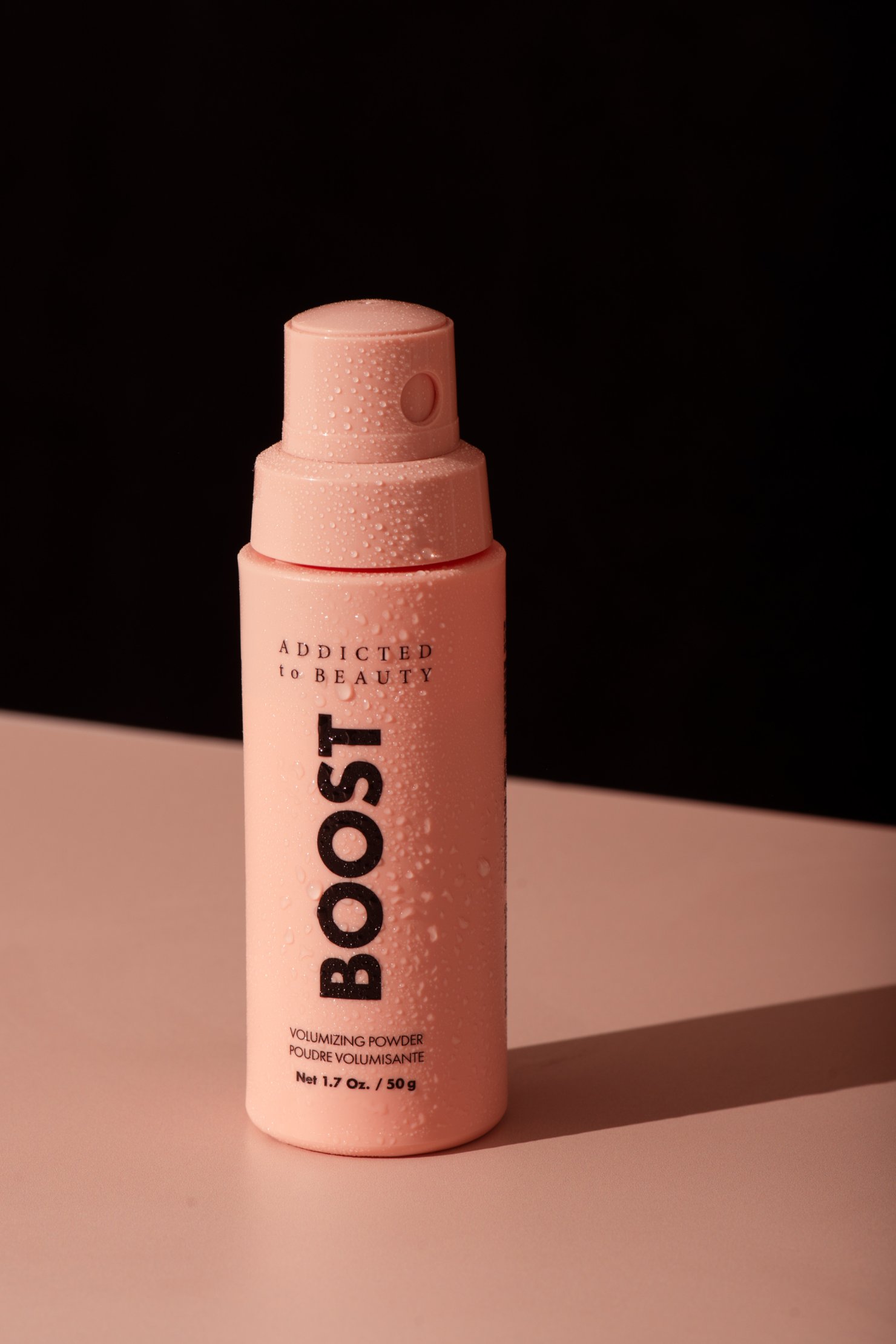 Boost hair care product photography close up with dramatic shadow
