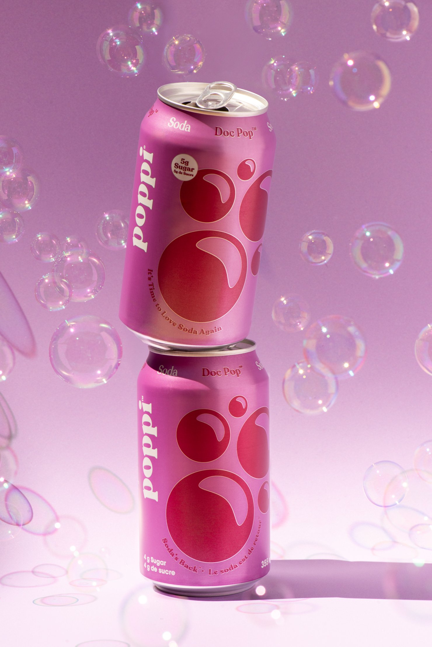 Poppi Doc Creative commercial photography of soda cans stacked with bubbles around them