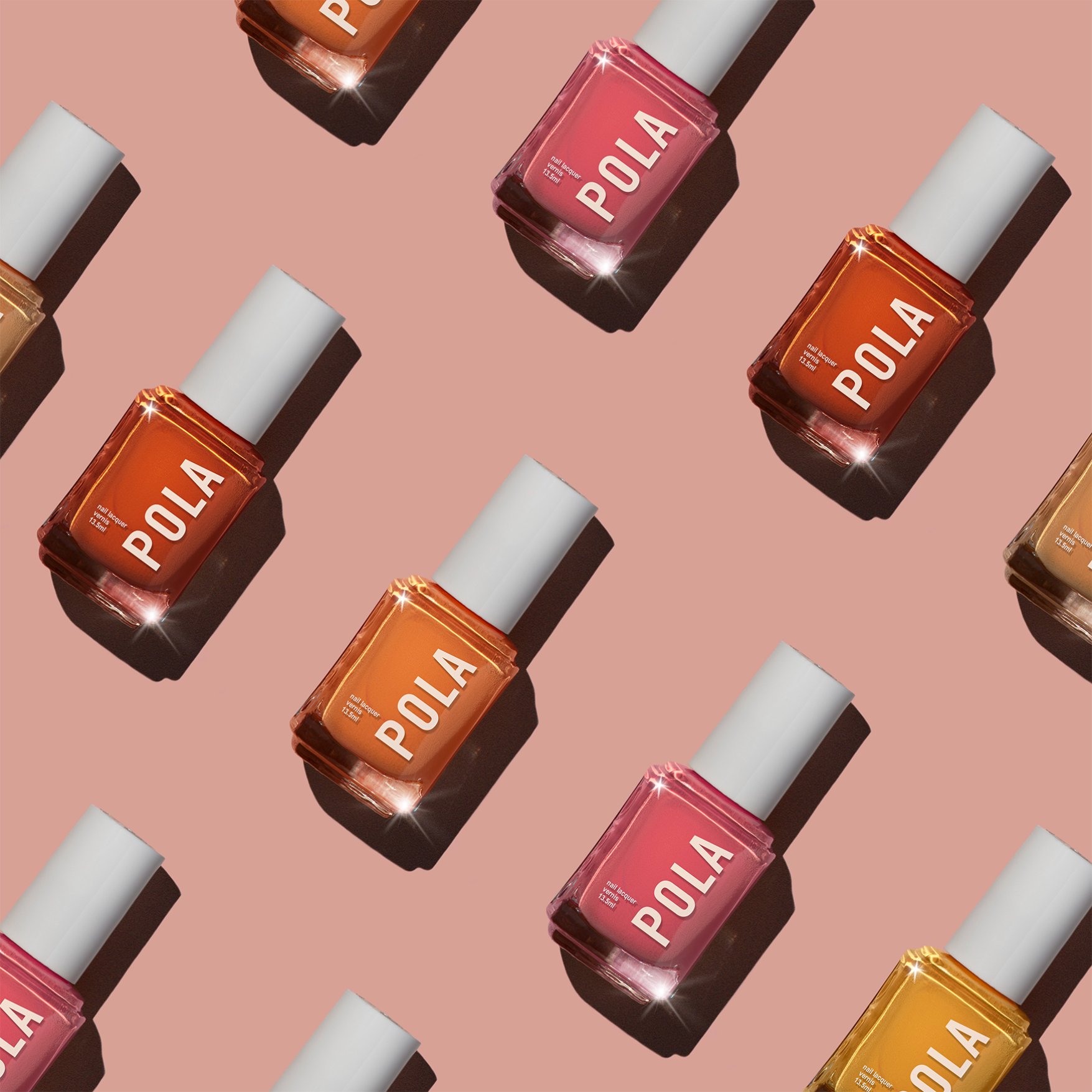 Repeating pattern of colourful nail polish